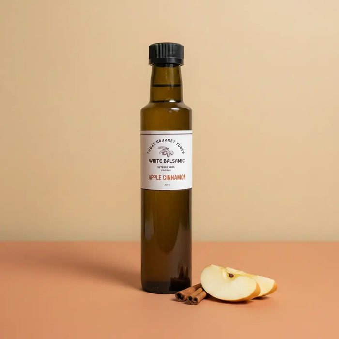 Apple Cinnamon White Balsamic Vinegar 250ml bottle on warm terracotta surface