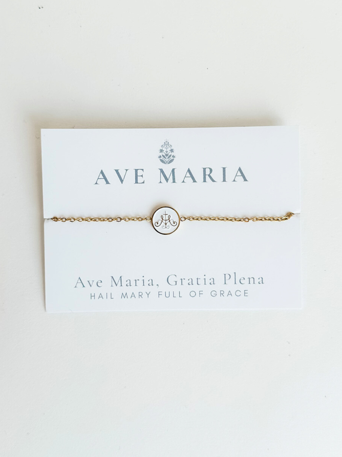 Gold chain with circle white middle with gold border