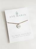 Ava Maria symbol on white background with gold border attached to golden chain