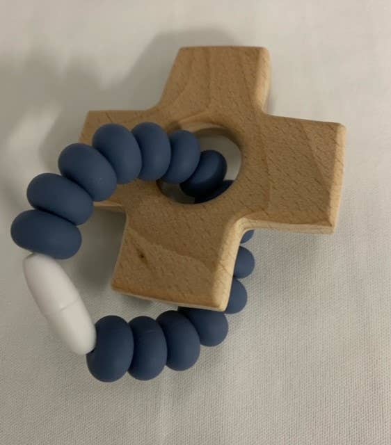 Wooden cross shaped teether with blue silicone beads