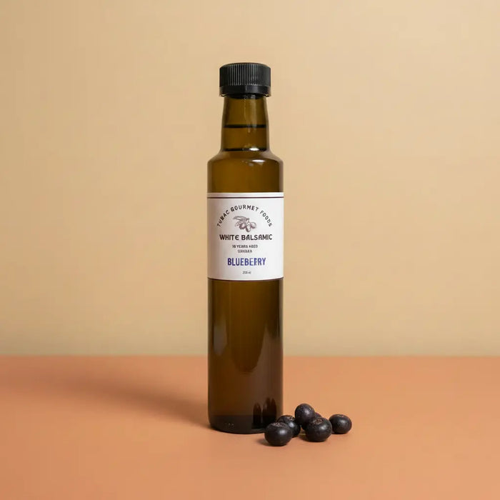 Blueberry White Balsamic Vinegar 250ml bottle on warm terracotta surface