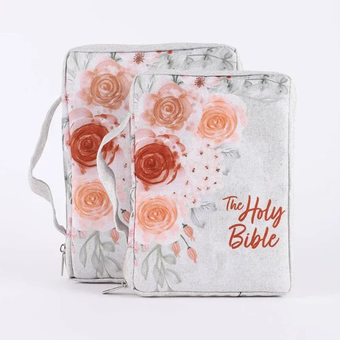Floral-patterned Bible cover with 'The Holy Bible' text on a white background