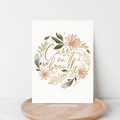 Motivational poster with floral design and 'Carry on bravely' text on a white background