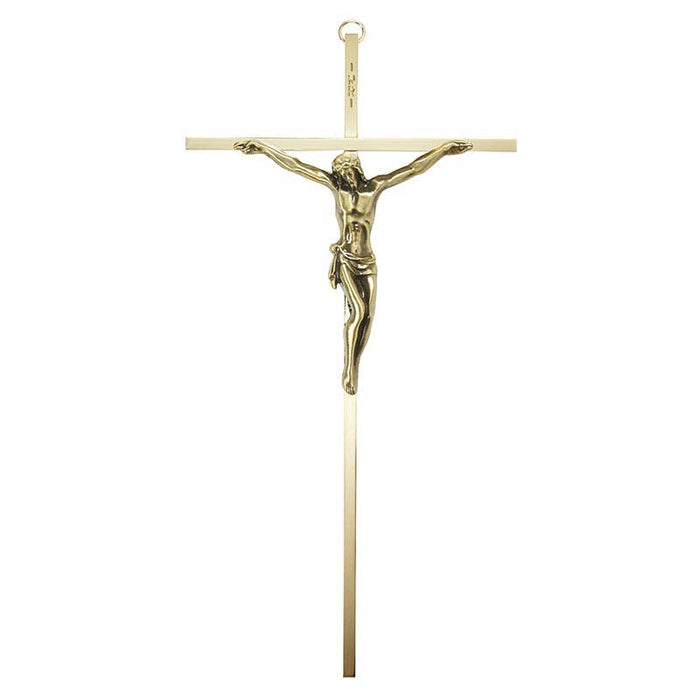 Gold crucifix pendant on a white background