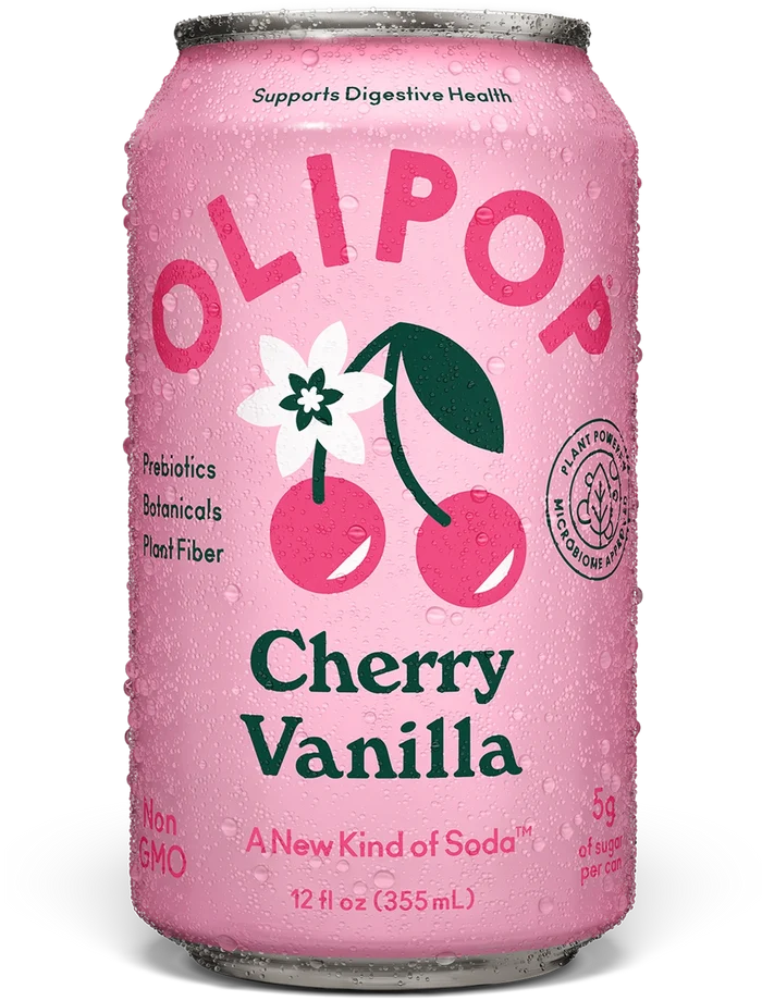 Pink can of Olipop Cherry Vanilla soda with cherry illustration, 12 fl oz, condensation on surface.