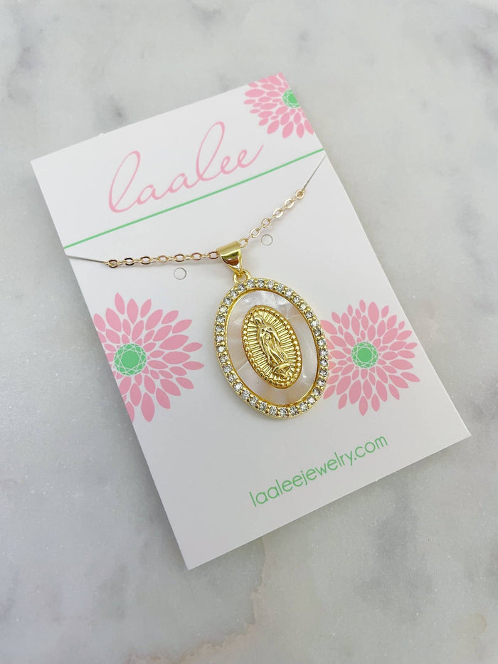 Gold necklace on a card with pink flowers and 'Laalee' branding