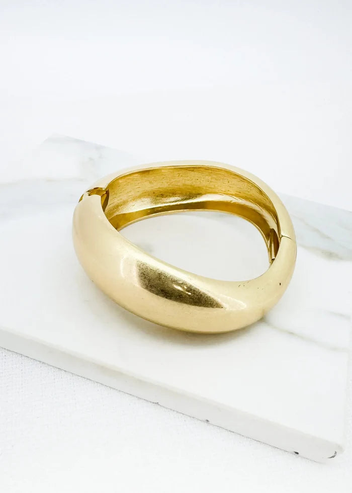 Envy Jewellery - Worn gold wide hinged bangle
