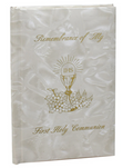 White book with first communion and gold design