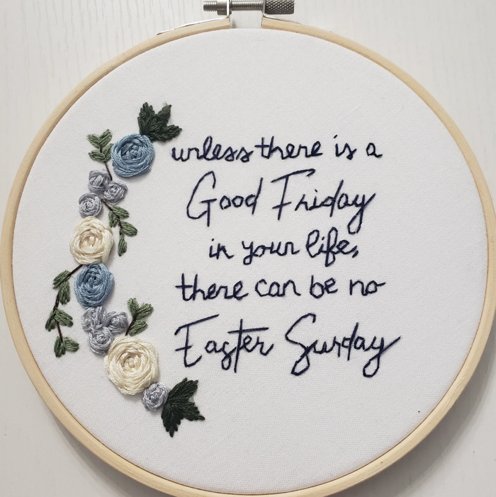 Embroidery hoop with floral design.