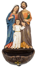 Statue of the Holy Family, on a white background.