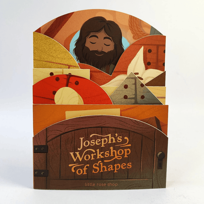 Cardboard packaging for 'Joseph's Workshop of Shapes' with illustrations and text.