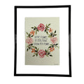 Framed artwork with floral design and text on a white background