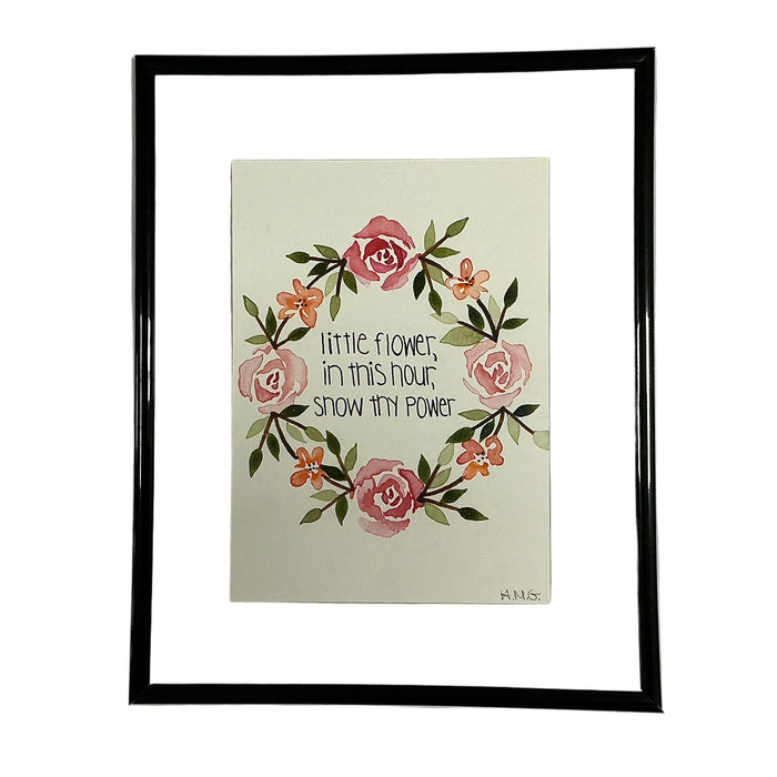 Framed artwork with floral design and text on a white background