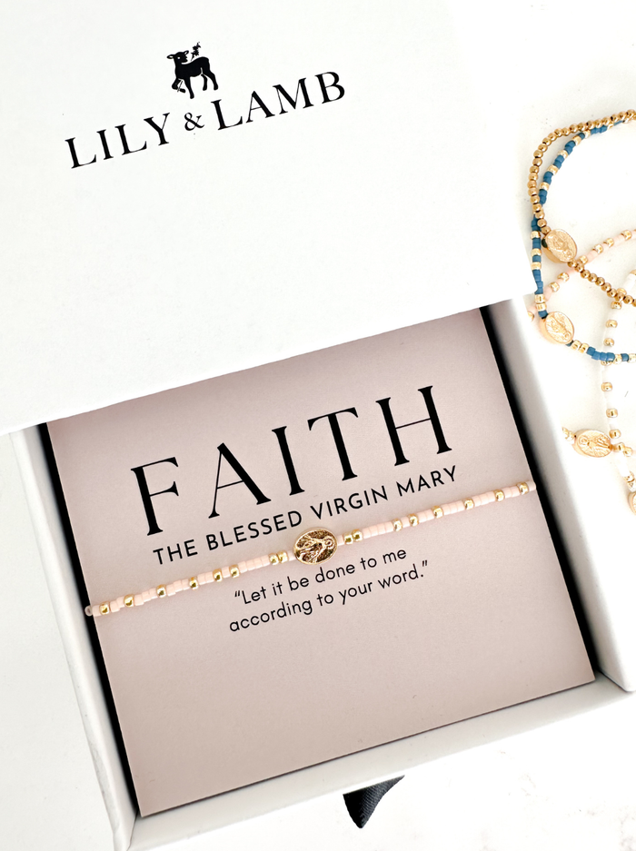 Jewelry box with 'FAITH' bracelet and 'LILY & LAMB' branding