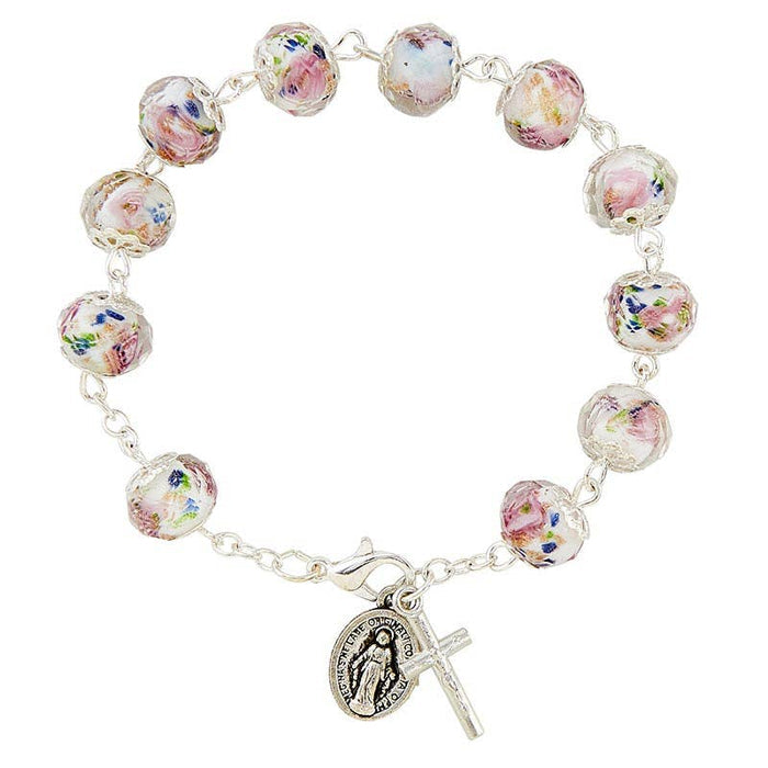 Silver bracelet with pink and colorful beads with miraculous medal and cross.