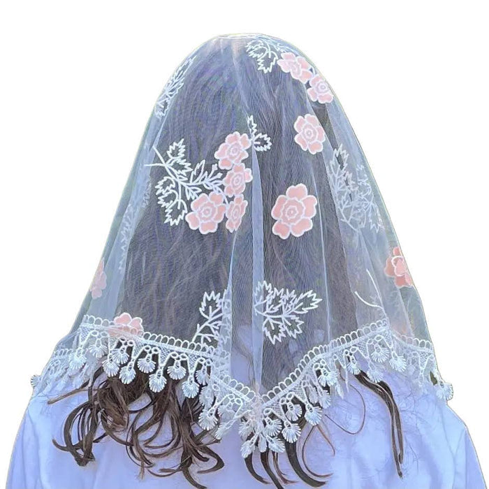 Veil with floral embroidery on a white background