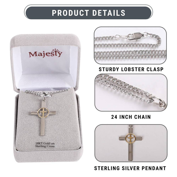 Silver cross pendant necklace with packaging and product details on a white background