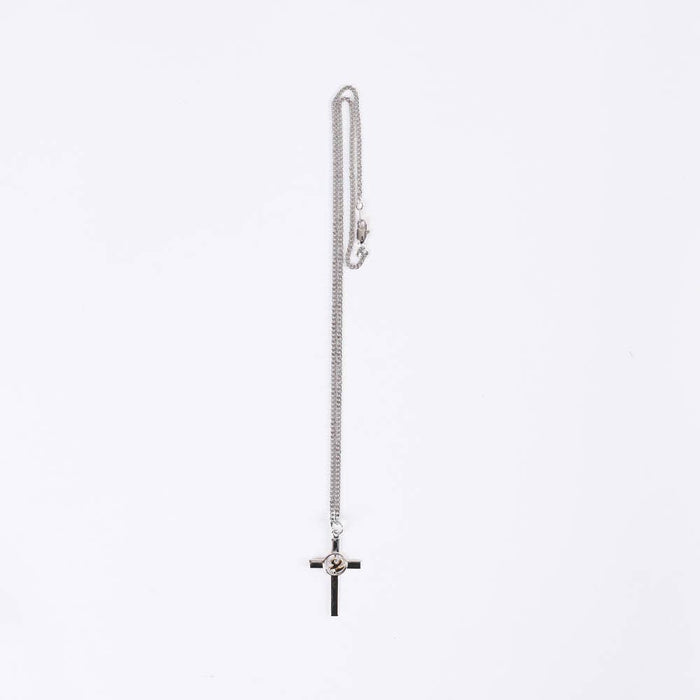 Silver chain necklace with a cross pendant on a white background
