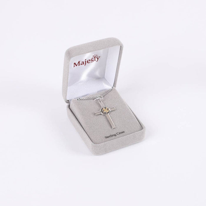 Silver cross necklace in a 'Majesty' jewelry box on a white background