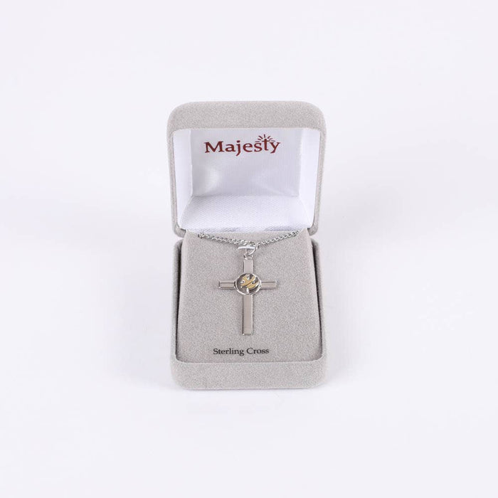 Silver cross necklace in a Majesty jewelry box on a white background