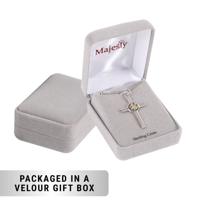 Silver cross pendant in a Majesty jewelry box with a clear lid.