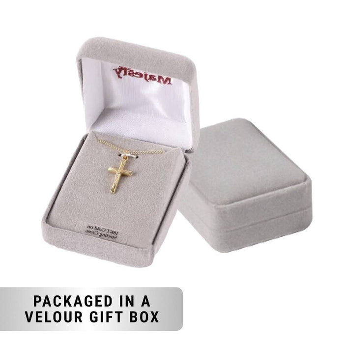 Gold cross necklace in an open velour gift box with 'Macy's' branding.