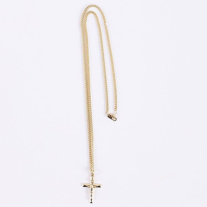 Gold chain necklace with a cross pendant on a light gray background