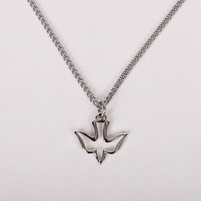 Silver dove pendant necklace on a light gray background