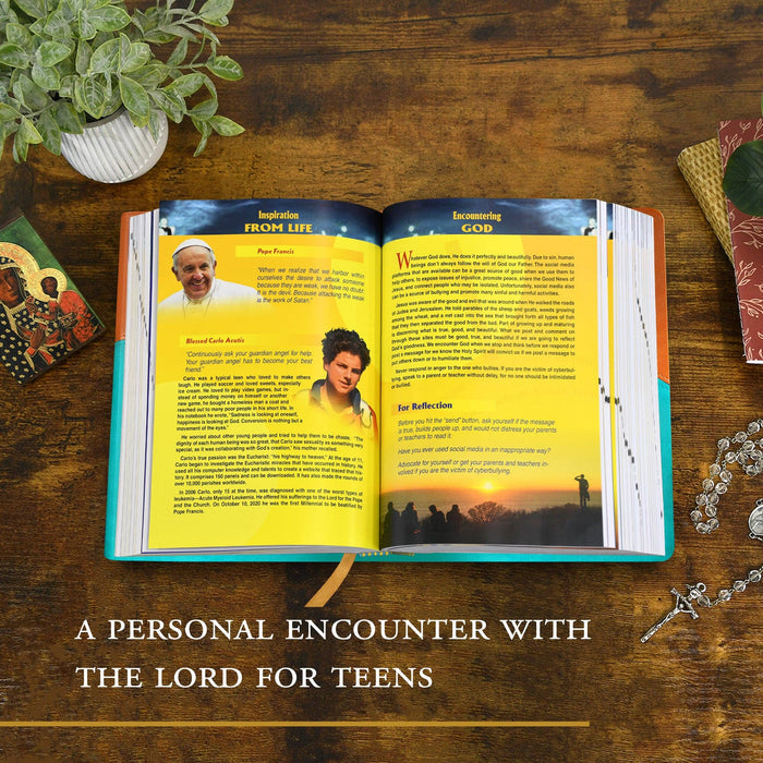 Open book on a wooden table with text 'A Personal Encounter with the Lord for Teens' and images of Pope Francis and a young person.