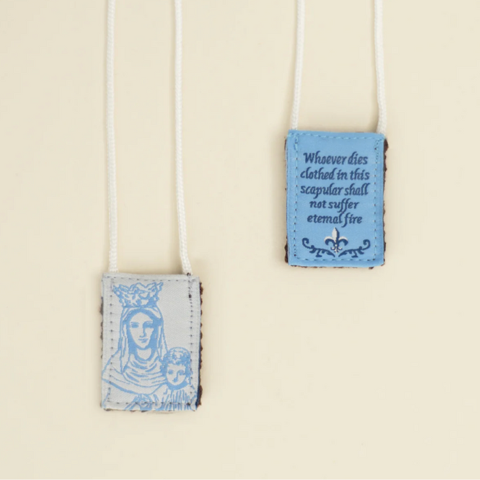 Scapular with religious design and text on a beige background