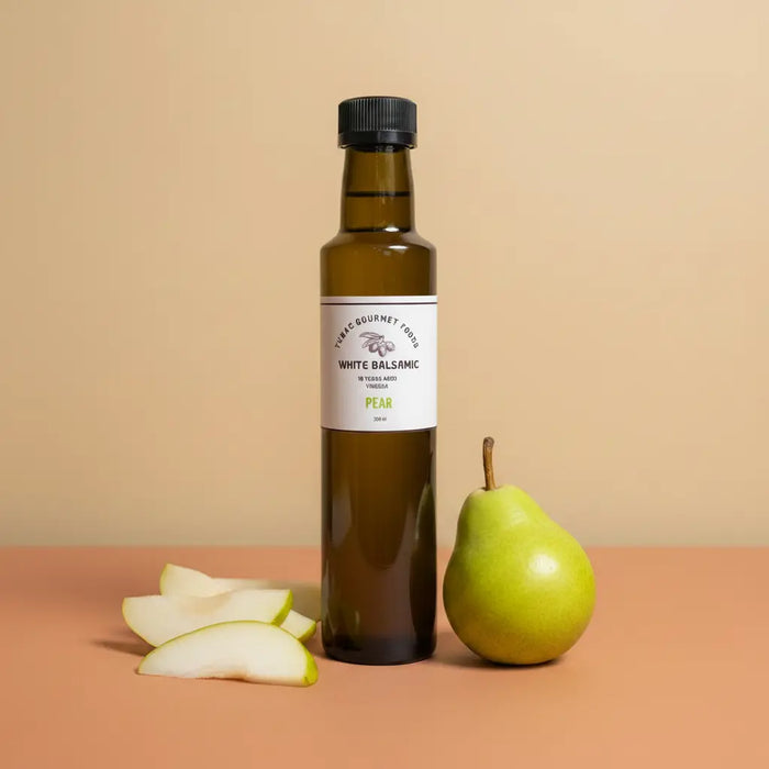 Pear White Balsamic Vinegar 250ml bottle on warm terracotta surface