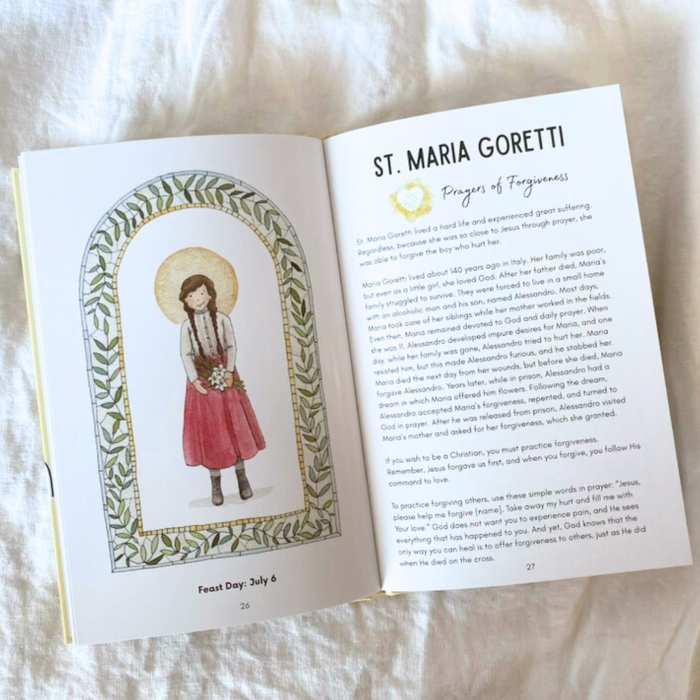 Open book with illustration of a saint and text on a soft white background