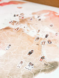 Map of a region with illustrated figures and numbers on a textured surface