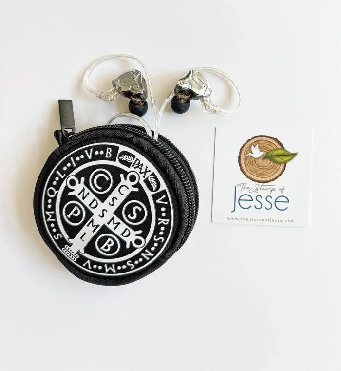 Black circular pouch with white emblem and keychain on a white background, featuring 'The Stamps of Jesse' logo.