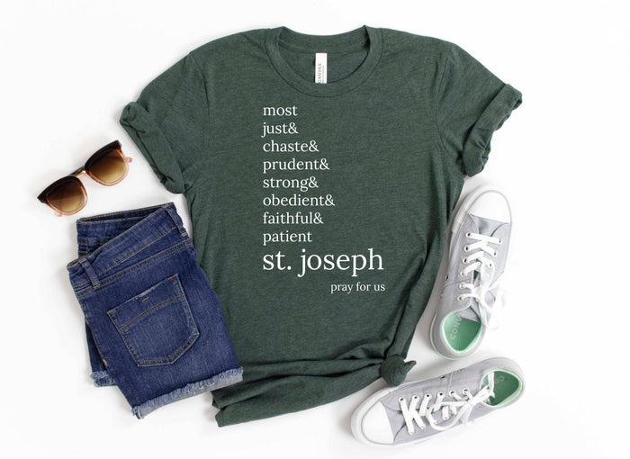 Green shirt  that says “most just & chaste & prudent & strong & obedient & faithful & patient- st. Joseph pray for us”