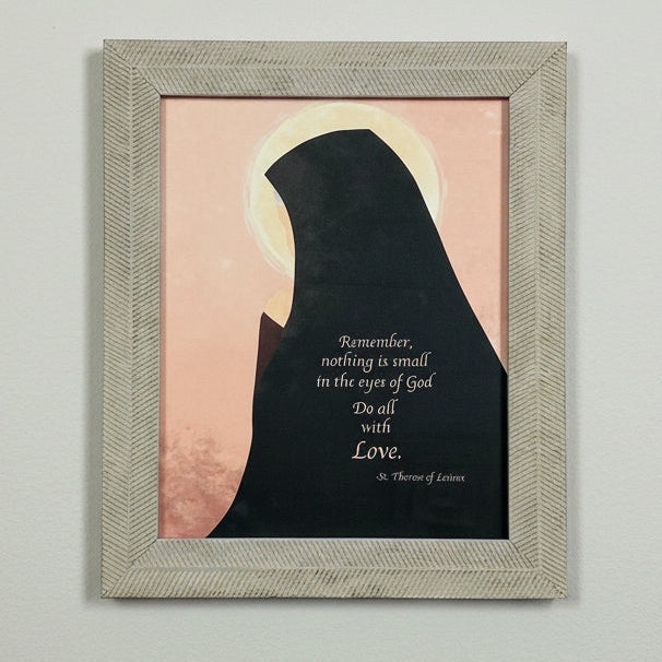 Framed artwork with silhouette and inspirational quote on a grey wall