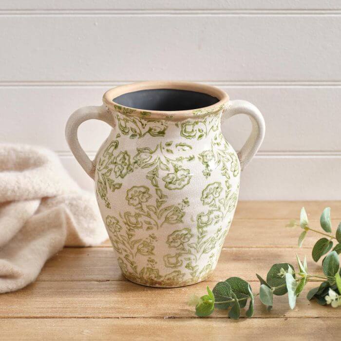Stoneware Urn Vase with double handles and soft green toile de Jouy pattern on cream background.