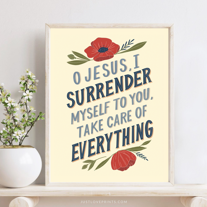 Framed print with inspirational quote 'O Jesus, I surrender myself to you, take care of everything' on a light background.
