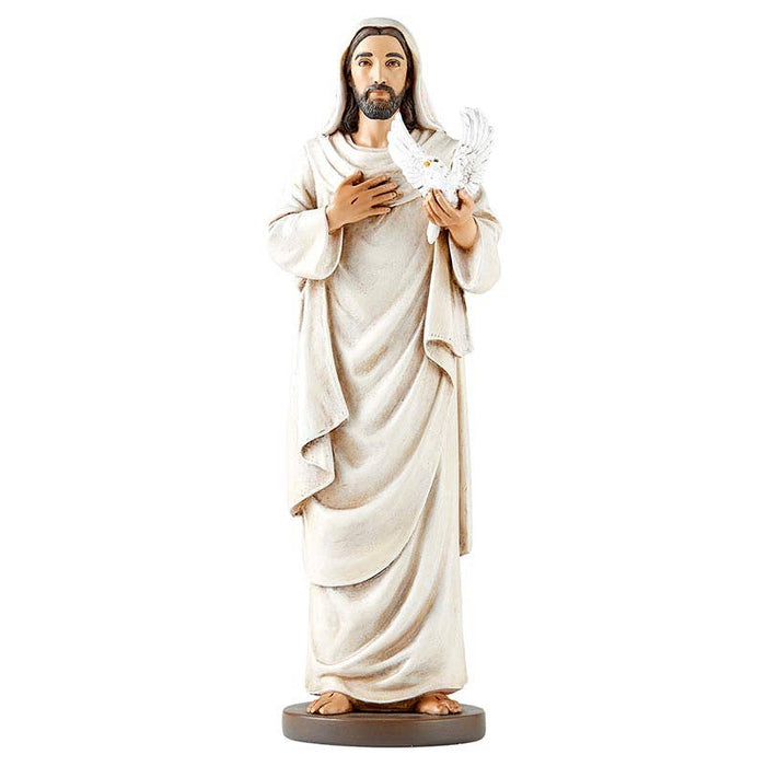 Statue of a jesus in a white robe holding a dove on a white background