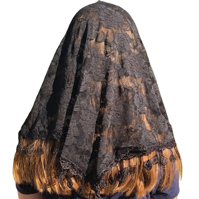 Black lace veil with brown trim on a white background