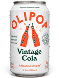 Aluminum can of OLIPOP Vintage Cola soda with condensation, featuring red and green text on white background, 12 fl oz.